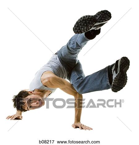 Stock Photo - Portrait of a young man break dancing. Fotosearch