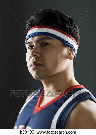 Portrait of a young man in a basketball jersey View Large Photo Image Stock Image - Portrait of a young man in a basketball jersey. Fotosearch