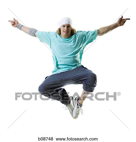 Portrait of a young man jumping View Large Photo Image Stock Photo - Portrait of a young man jumping. Fotosearch