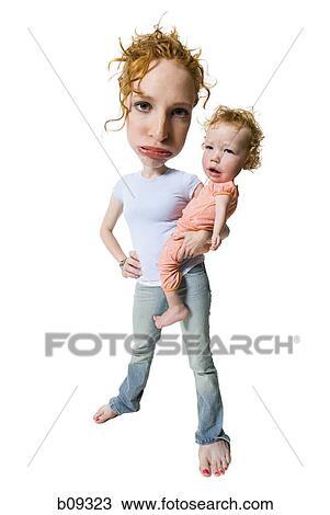 Portrait of a young woman holding her daughter View Large Photo Image Stock Image - Portrait of a young woman holding her daughter. Fotosearch
