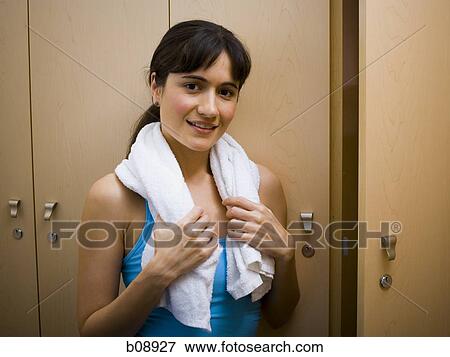 Stock Photo - Portrait of a young woman smiling. Fotosearch