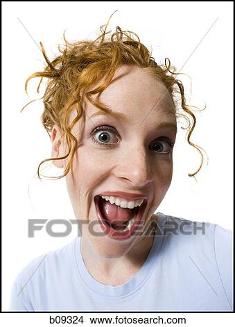 Portrait of a young woman with her mouth open View Large Photo Image Picture - Portrait of a young woman with her mouth open. Fotosearch