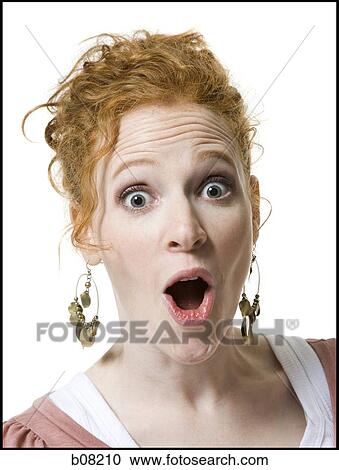 Portrait of a young woman with her mouth open View Large Photo Image Stock Image - Portrait of a young woman with her mouth open. Fotosearch