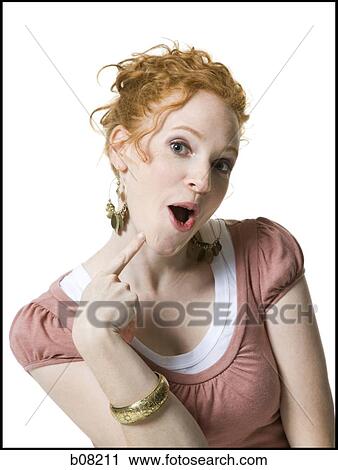 Portrait of a young woman with her mouth open View Large Photo Image Stock Image - Portrait of a young woman with her mouth open. Fotosearch
