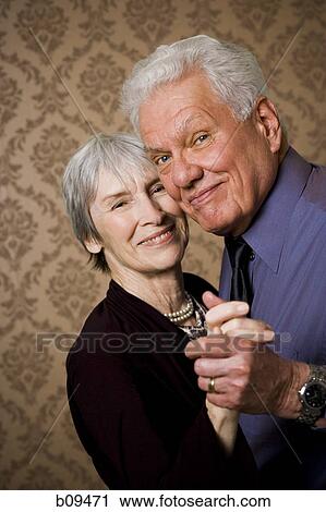 Portrait of an elderly couple dancing View Large Photo Image Stock Image - Portrait of an elderly couple dancing. Fotosearch