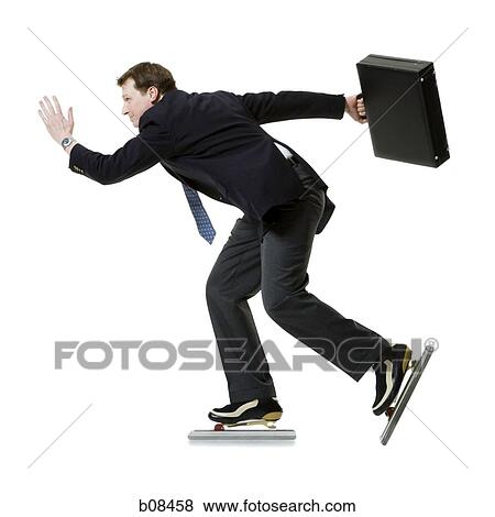 Profile of a businessman ice-skating and holding a briefcase View Large Photo Image Stock Photo - Profile of a businessman ice-skating and holding a briefcase. Fotosearch