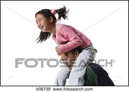 Profile of a girl sitting on her father's shoulders View Large Photo Image Stock Photo - Profile of a girl sitting on her father's shoulders. Fotosearch