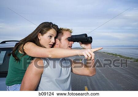 Profile of a mid adult man and a young woman View Large Photo Image Picture - Profile of a mid adult man and a young woman. Fotosearch