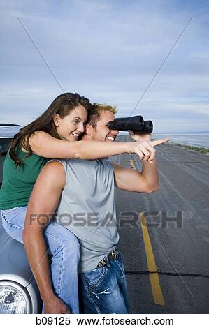 Profile of a mid adult man and a young woman View Large Photo Image Stock Photography - Profile of a mid adult man and a young woman. Fotosearch