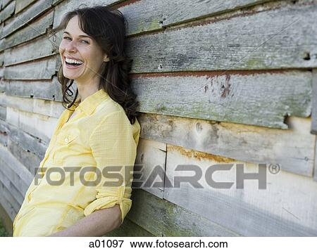 Profile of a woman smiling View Large Photo Image Stock Photo - Profile of a woman smiling. Fotosearch