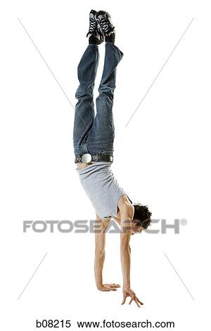 Stock Photography - Profile of a young man break dancing. Fotosearch
