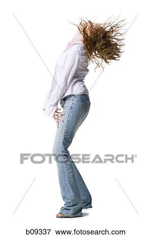 Stock Photo - Profile of a young woman dancing. Fotosearch