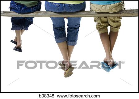Rear view of a mother and her two children sitting on a wooden plank View Large Photo Image Stock Photography - Rear view of a mother and her two children sitting on a wooden plank. Fotosearch