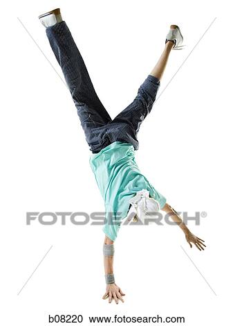 Rear view of a young man break dancing View Large Photo Image Stock Image - Rear view of a young man break dancing. Fotosearch
