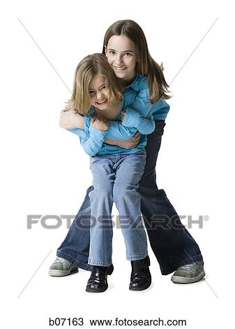 Sisters playfighting View Large Photo Image Stock Image - Sisters playfighting. Fotosearch