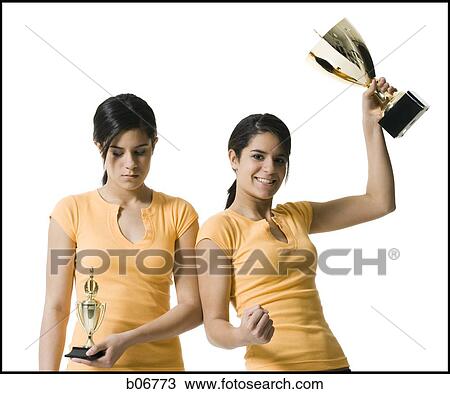 Sisters with trophies View Large Photo Image Stock Image - Sisters with trophies. Fotosearch