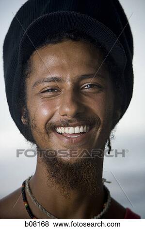 Smiling Rastafarian male View Large Photo Image Stock Photo - Smiling Rastafarian male. Fotosearch