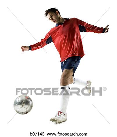 Soccer player kicking ball View Large Photo Image Stock Image - Soccer player kicking ball. Fotosearch