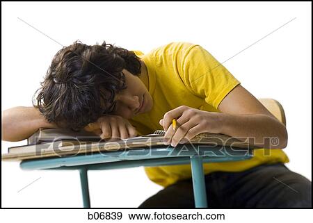 Stock Photo - Student sleeping at school desk. Fotosearch