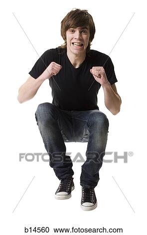 Teenage boy leaping View Large Photo Image Stock Image - Teenage boy leaping. Fotosearch