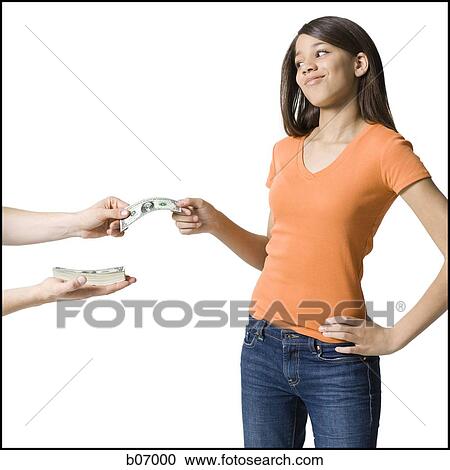Teenage girl accepting banknote View Large Photo Image Stock Image - Teenage girl accepting banknote. Fotosearch