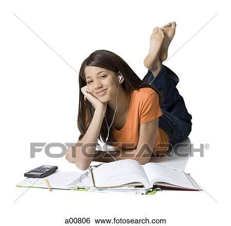 Teenage girl doing homework View Large Photo Image Stock Photograph - Teenage girl doing homework. Fotosearch
