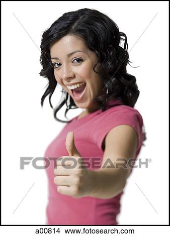 Teenage girl giving thumbs up sign View Large Photo Image Picture - Teenage girl giving thumbs up sign. Fotosearch