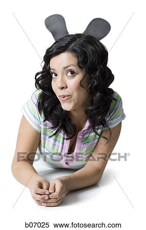 Teenage girl lying down looking up View Large Photo Image Stock Photography - Teenage girl lying down looking up. Fotosearch