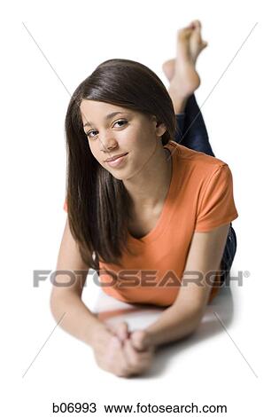 Teenage girl lying down View Large Photo Image Stock Image - Teenage girl lying down. Fotosearch