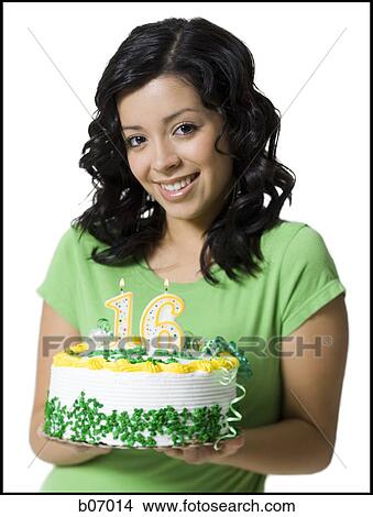 Teenage girl with birthday cake and candles View Large Photo Image Picture - Teenage girl with birthday cake and candles. Fotosearch