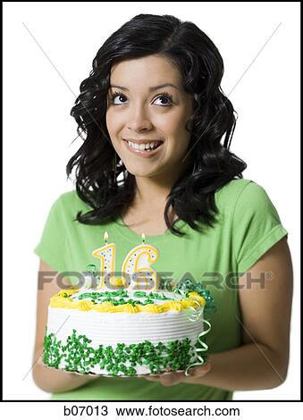 Teenage girl with birthday cake and candles View Large Photo Image Stock Image - Teenage girl with birthday cake and candles. Fotosearch
