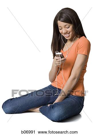 Teenage girl with listening device View Large Photo Image Stock Image - Teenage girl with listening device. Fotosearch