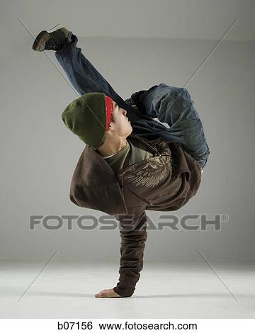Teenager breakdancing View Large Photo Image Stock Photograph - Teenager breakdancing. Fotosearch