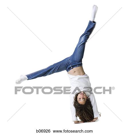 Teenager doing cartwheel View Large Photo Image Stock Photograph - Teenager doing cartwheel. Fotosearch