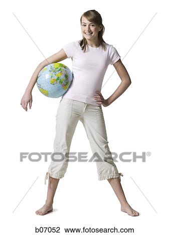 Teenager holding earth globe View Large Photo Image Stock Image - Teenager holding earth globe. Fotosearch