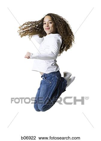 Stock Image - Teenager jumping. Fotosearch