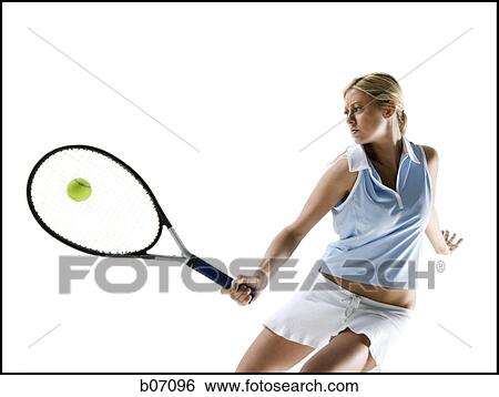 Tennis player hitting ball View Large Photo Image Stock Photograph - Tennis player hitting ball. Fotosearch