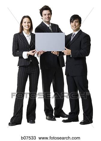 Three business people holding a blank sign View Large Photo Image Stock Image - Three business people holding a blank sign. Fotosearch