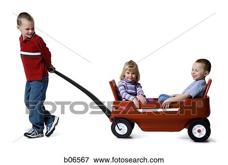 Three children with toy wagon View Large Photo Image Stock Photo - Three children with toy wagon. Fotosearch