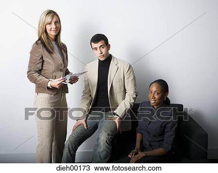Three office workers posing View Large Photo Image Stock Image - Three office workers posing. Fotosearch