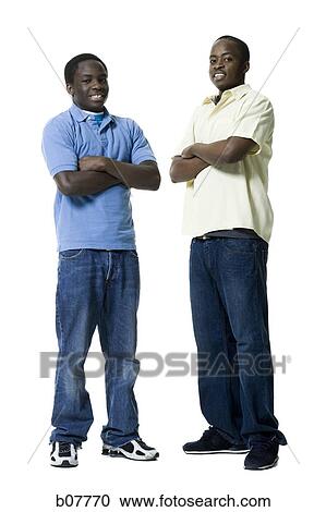 Two African-American brothers posing with arms folded View Large Photo Image Stock Image - Two African-American brothers posing with arms folded. Fotosearch
