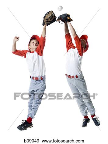 Two baseball players jumping View Large Photo Image Stock Photo - Two baseball players jumping. Fotosearch