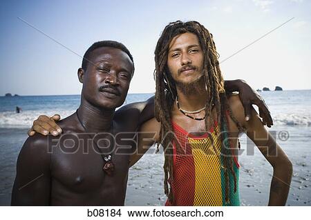 Two black male friends on beach View Large Photo Image Picture - Two black male friends on beach. Fotosearch