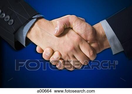 Two hands shaking View Large Photo Image Picture - Two hands shaking. Fotosearch