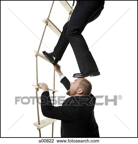 Two men climbing a ladder View Large Photo Image Stock Image - Two men climbing a ladder. Fotosearch