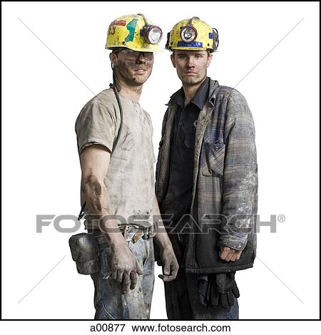 Two mine workers with flashlight helmets View Large Photo Image Stock Photo - Two mine workers with flashlight helmets. Fotosearch