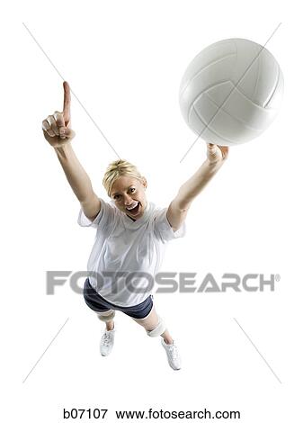 Volleyball player with ball making hand gesture View Large Photo Image Stock Photo - Volleyball player with ball making hand gesture. Fotosearch