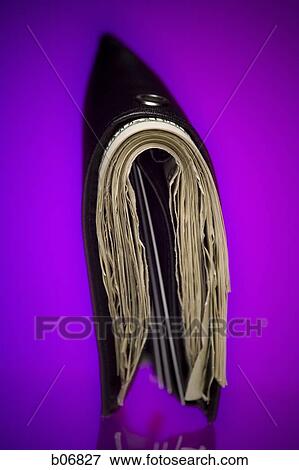 Wallet packed with banknotes View Large Photo Image Stock Photo - Wallet packed with banknotes. Fotosearch