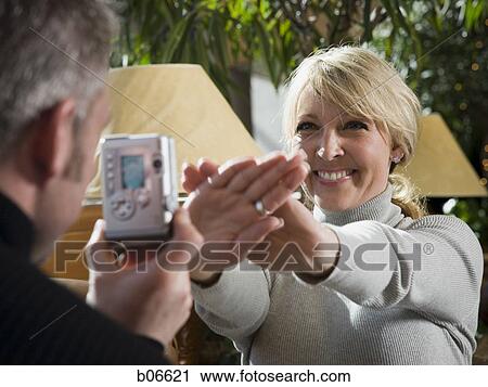 Wife refusing to have photo taken View Large Photo Image Stock Image - Wife refusing to have photo taken. Fotosearch