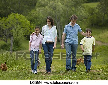 woman and a man with their son and daughter View Large Photo Image Stock Photograph - woman and a man with their son and daughter. Fotosearch